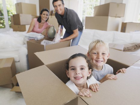 Moving van in Kingston upon Thames with recycling boxes and reusable furniture