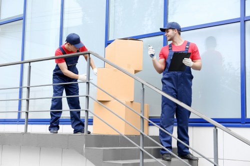 Moving team in Kingston Upon Thames preparing items with safety equipment