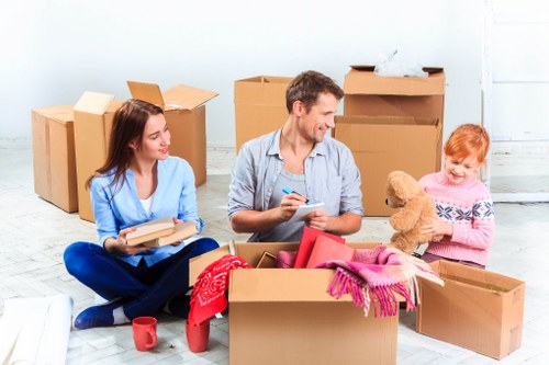 Flat removals in Kingston upon Thames with boxes and furniture ready for transport