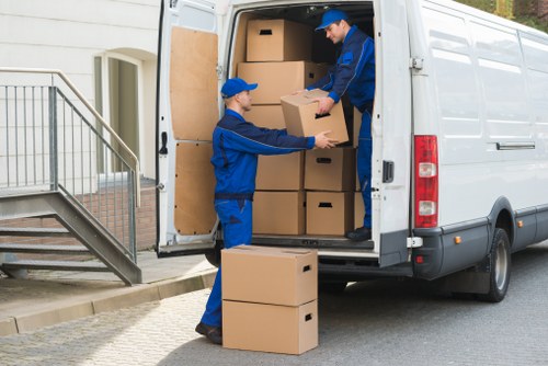 Van loading furniture and boxes for a move near Kingston town centre