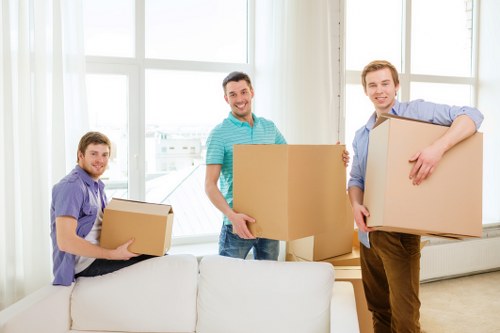 Team removing bulky furniture from a flat in Kingston