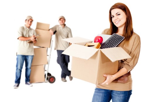 Furniture being moved from a flat in Kingston upon Thames by a local removals team