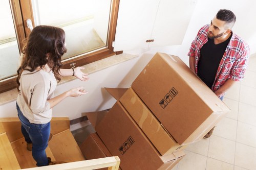 Packed moving boxes ready for transport during a Kingston removal