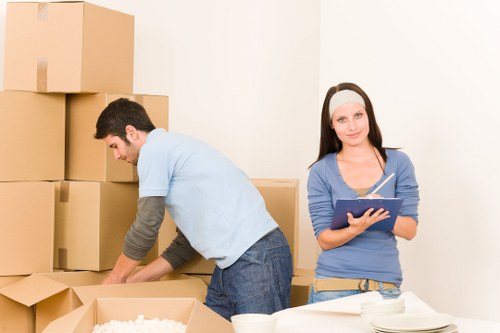 Staff preparing desks and IT items for a commercial relocation