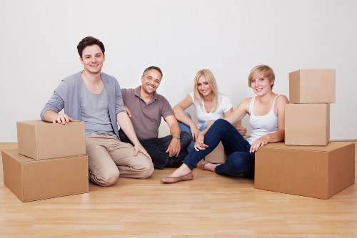 Furniture and boxes being loaded into a removal van in Kingston Upon Thames